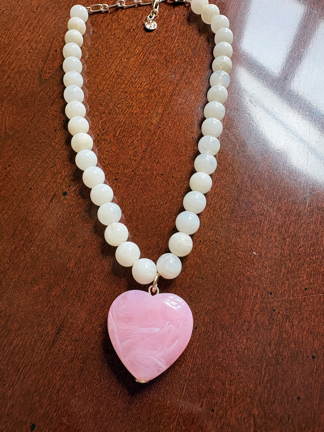 White Stone Circle with Pink Natural Stone Heart Charm